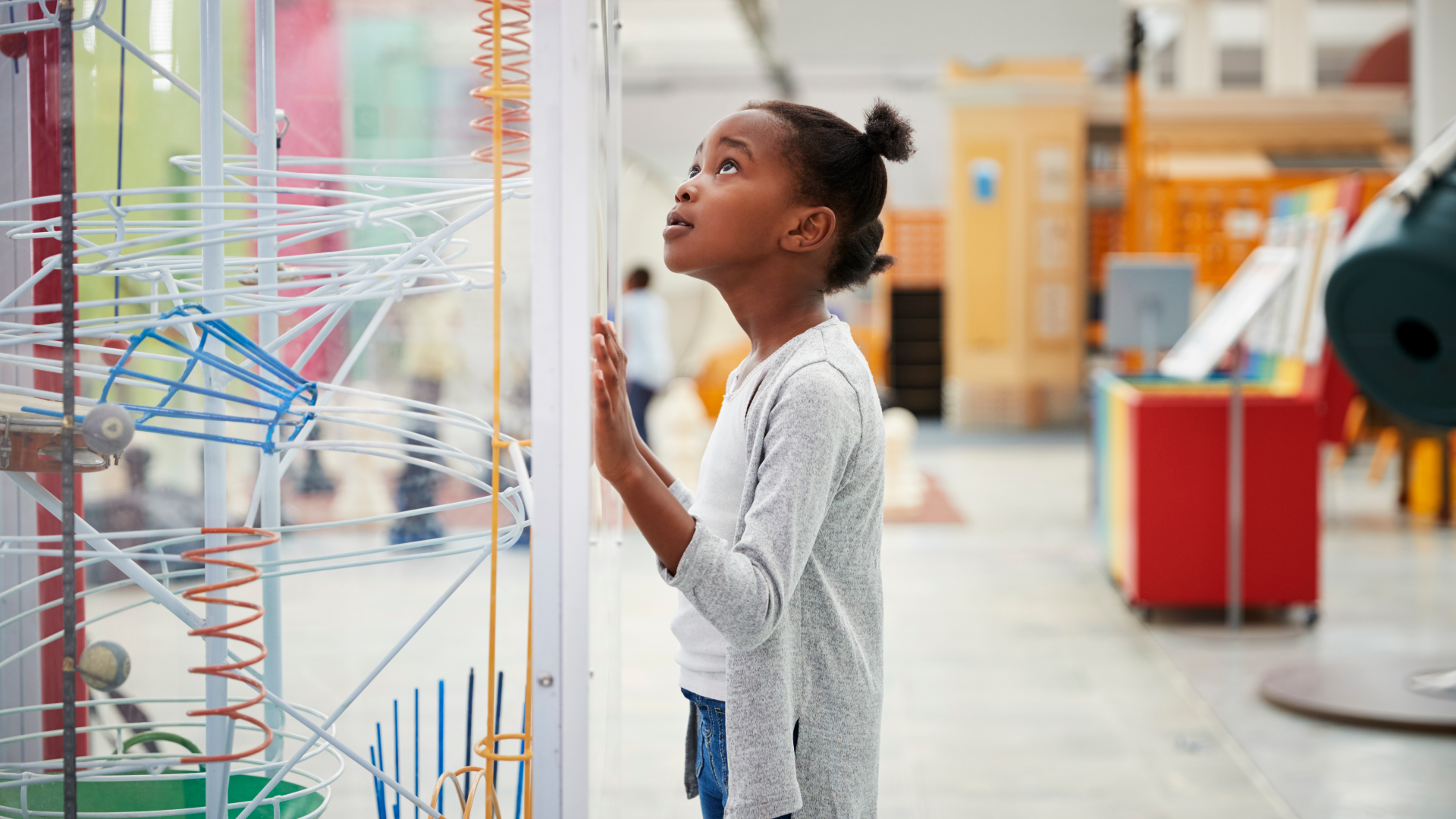 Children engaging with interactive science exhibits