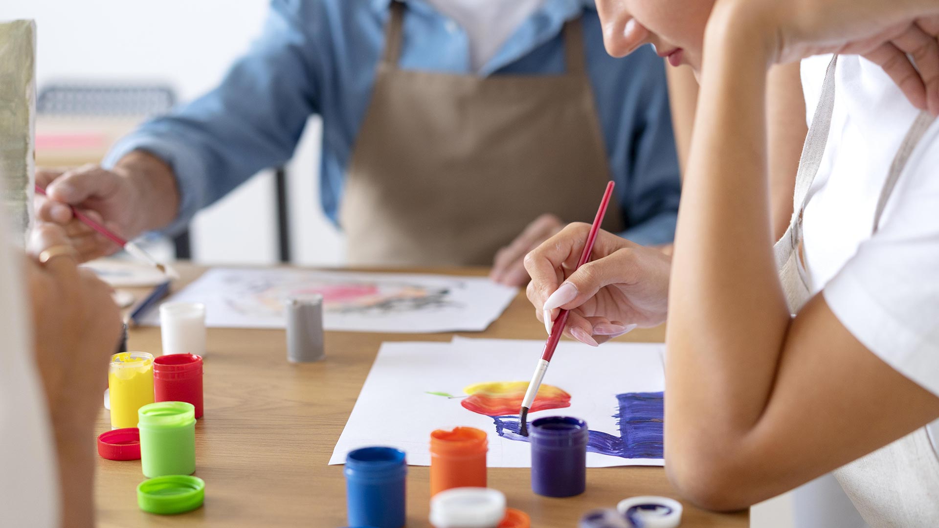 Families participating in an interactive art workshop